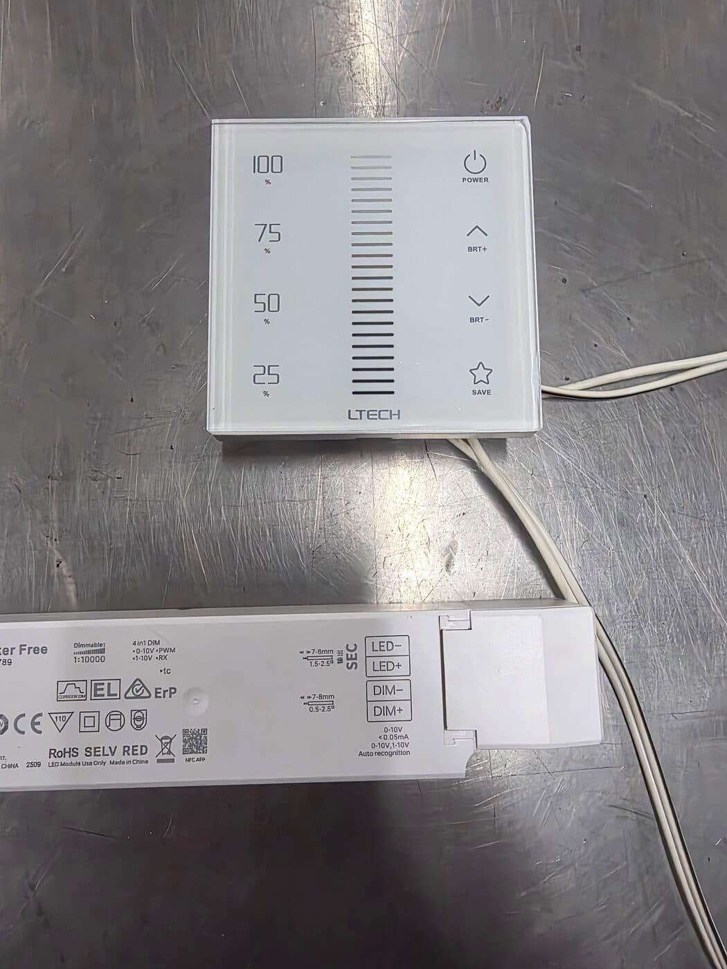 LTECH 0–10V touch wall dimmer panel showing 25/50/75/100% brightness scale next to the LED driver
